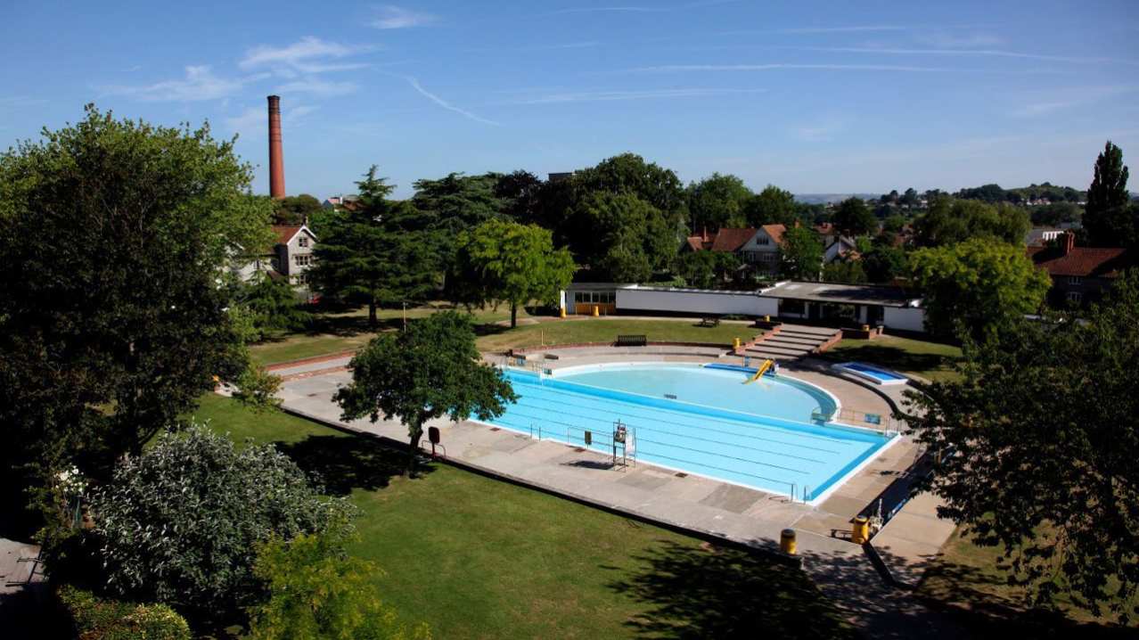 Aerial view of Greenbank Heated Outdoor Pool in Street