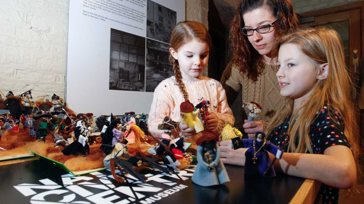 Mum and girls paying with dolls at National Civil War Centre - Newark Museum Mum and girls paying with dolls at National Civil War Centre - Newark Museum