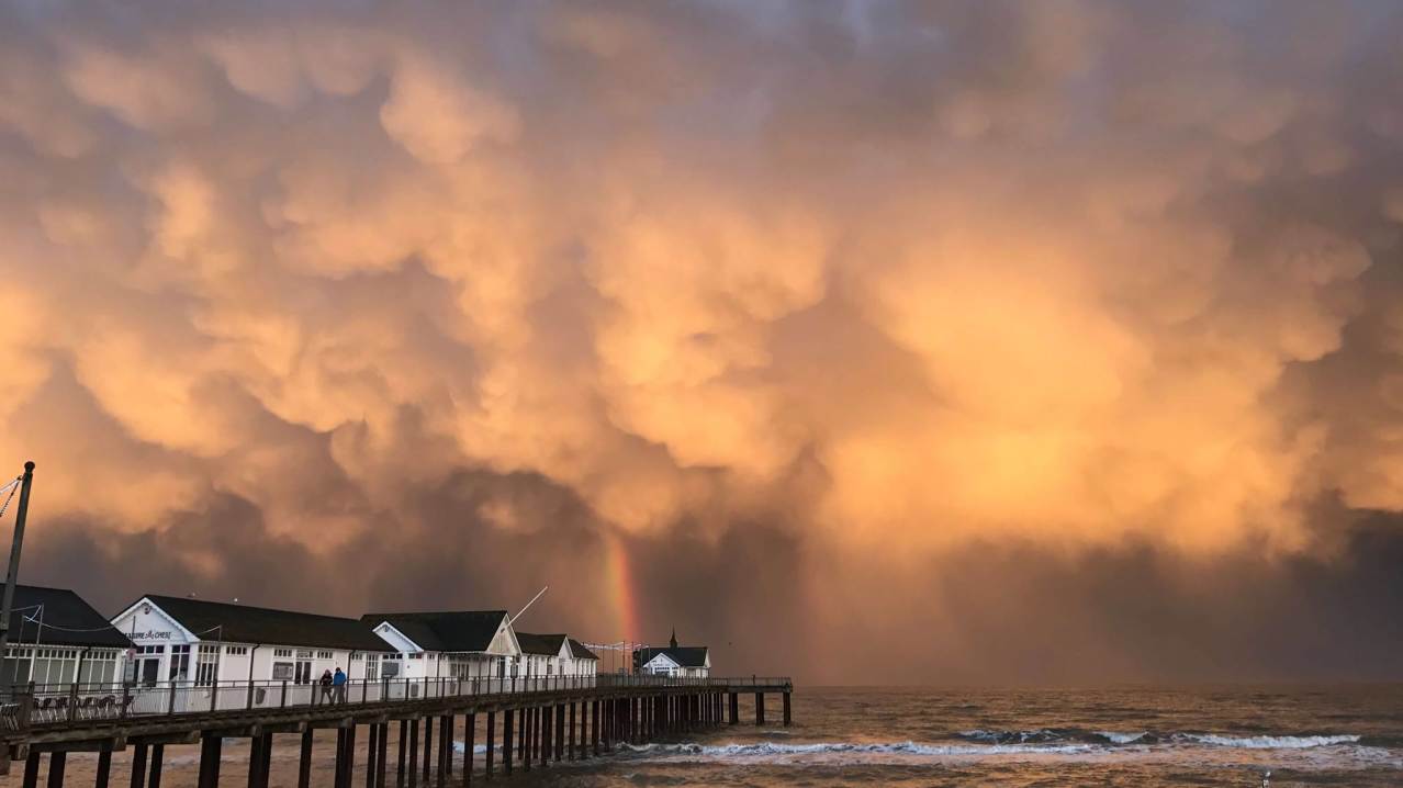 Sun shining through clouds at Southwold Pier Sun shining through clouds at Southwold Pier