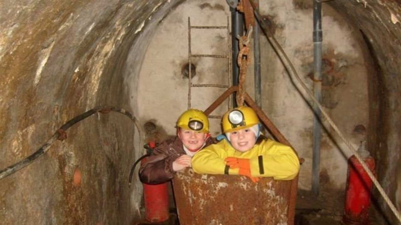 Kids in mine at Threlkeld Quarry and Mining Museum in Keswick Kids in mine at Threlkeld Quarry and Mining Museum in Keswick