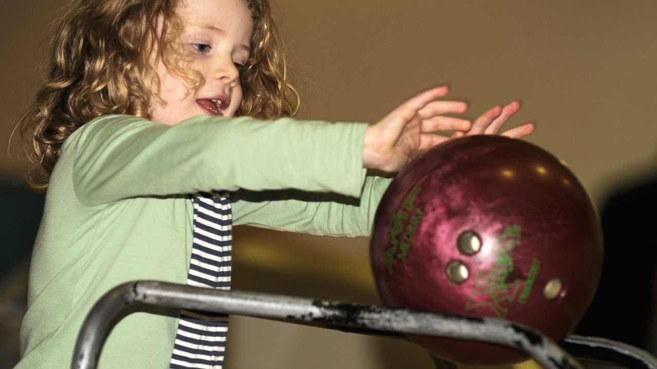 Girl bowling at Strikers at Fraserburgh Leisure Centre