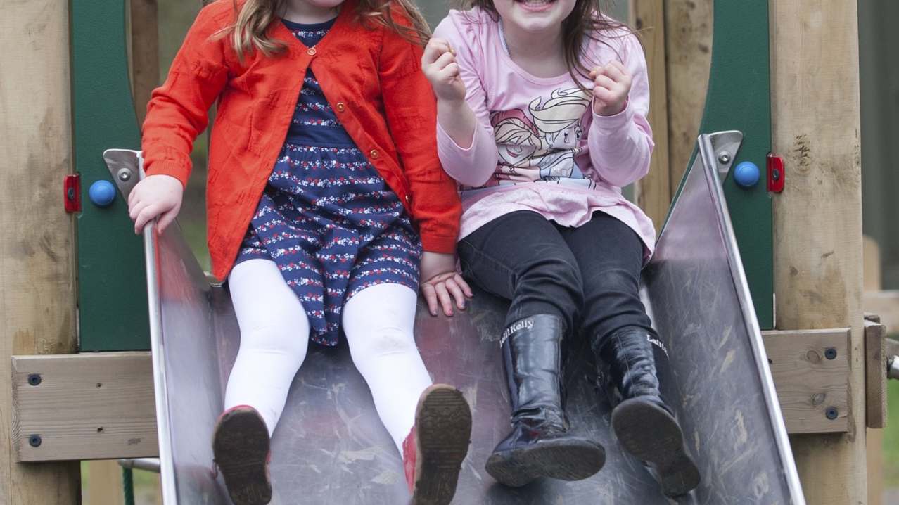 Girls on slide at Worsbrough Mill Museum and Country Park in Barnsley Girls on slide at Worsbrough Mill Museum and Country Park in Barnsley