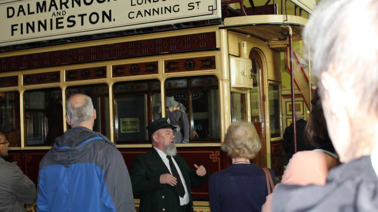Driver talking to visitors at Glasgow Riverside Museum Driver talking to visitors at Glasgow Riverside Museum