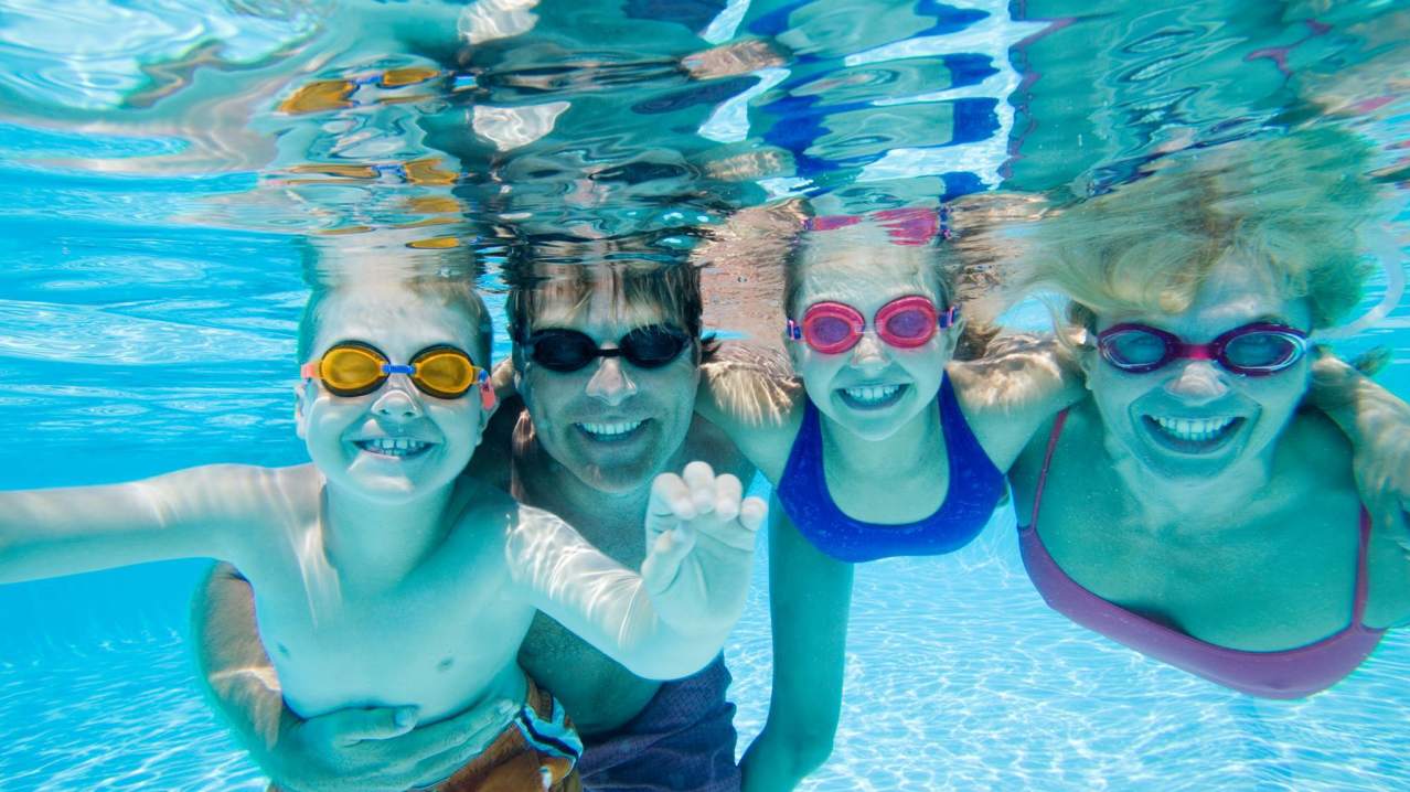 Family in swimming pool at Dimensions in Stoke on Trent