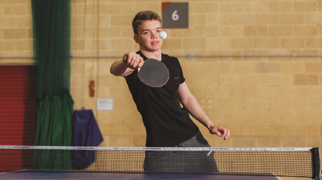 Guy playing table tennis at Redcar & Cleveland Leisure and Community Heart