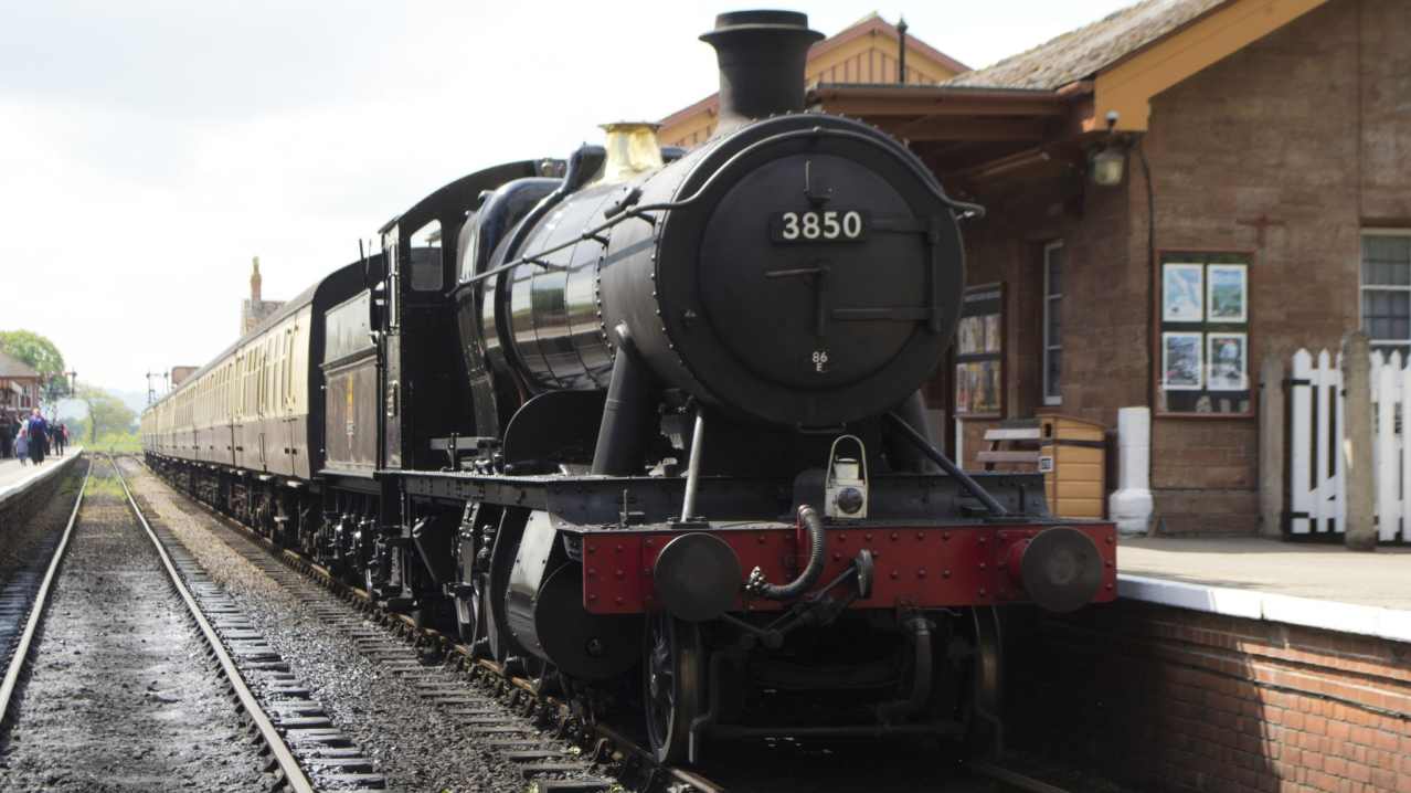 Steam train at platform at West Somerset Railway in Minehead