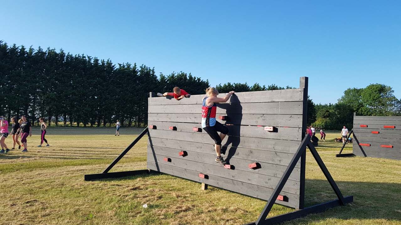 People doing obstacle course at Obstacle Training Ground in Royston