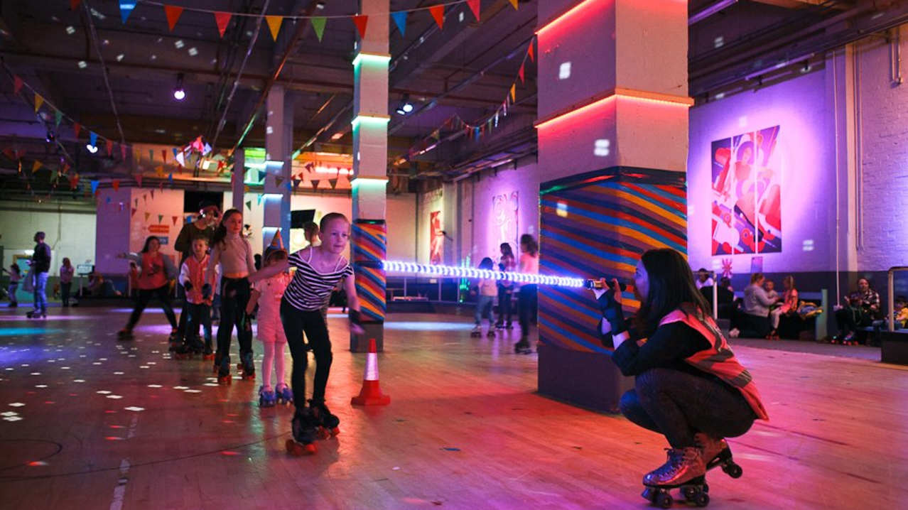 Families rollerskating at RollerStop Roller Rink in Glasgow Families rollerskating at RollerStop Roller Rink in Glasgow