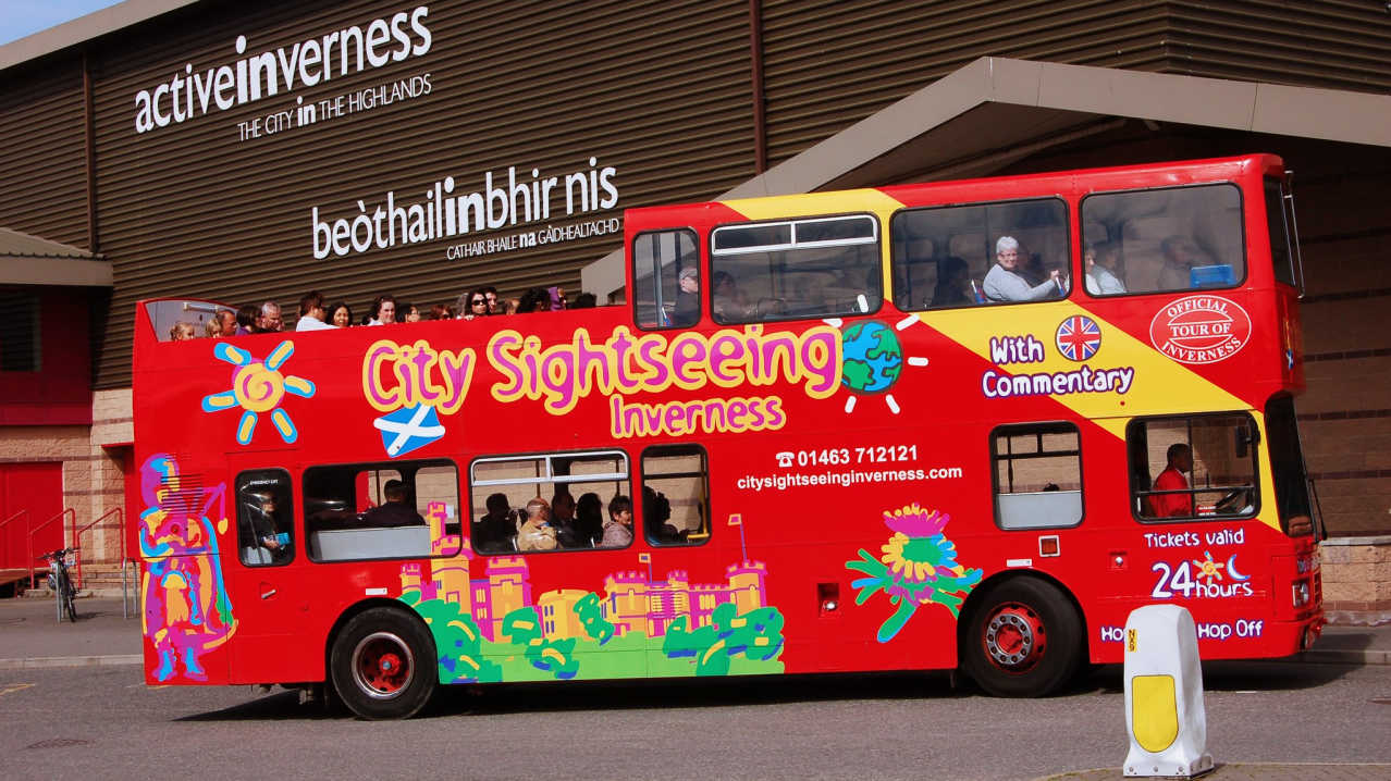 Passengers on City Sightseeing Inverness Hop On Hop Off bus Passengers on City Sightseeing Inverness Hop On Hop Off bus