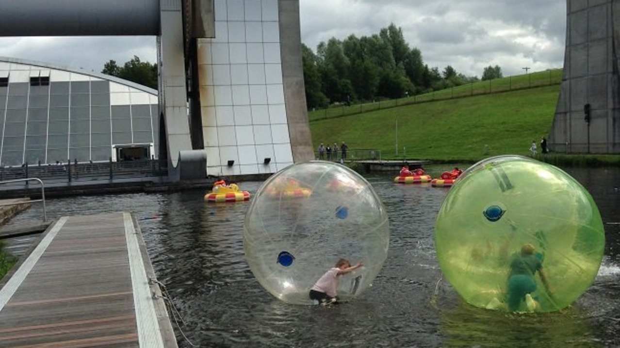 People water zorbing and dodgem boats at Outdoor Trax in Kilsyth People water zorbing and dodgem boats at Outdoor Trax in Kilsyth