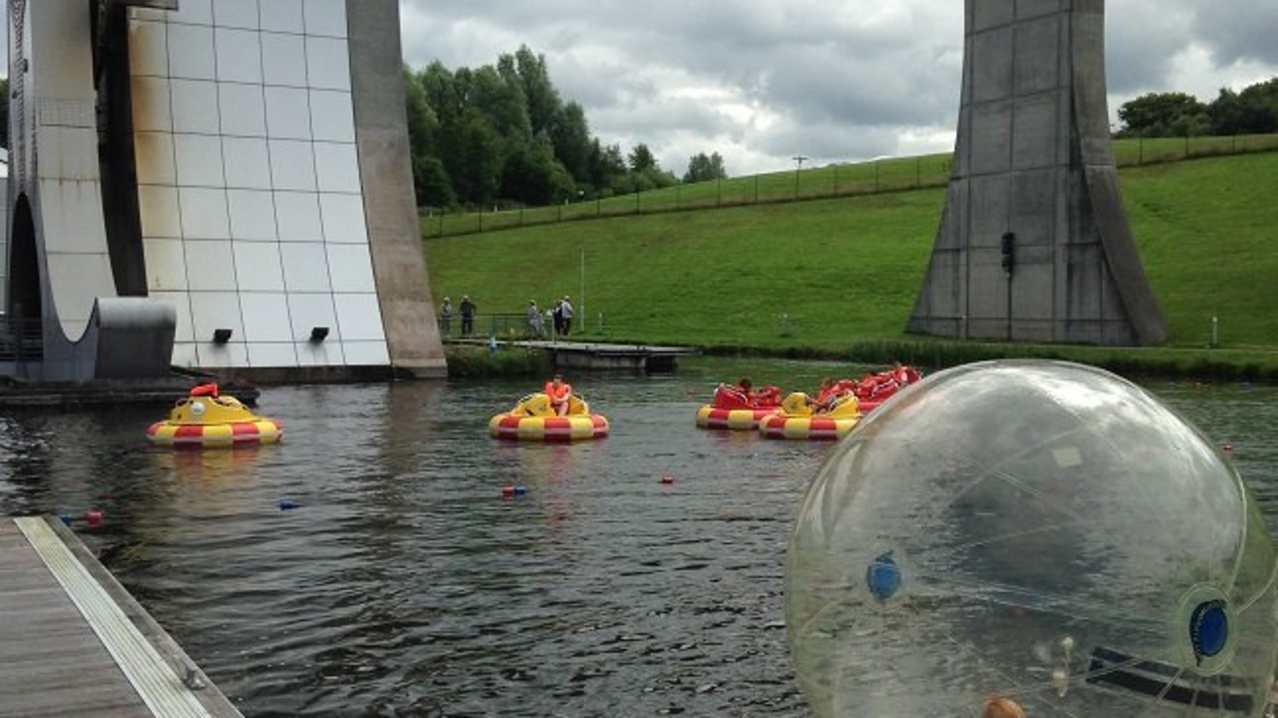 Kids water zorbing and dodgem boats at Outdoor Trax Kilsyth Kids water zorbing and dodgem boats at Outdoor Trax Kilsyth