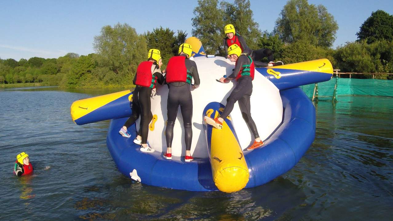 People on inflatable course on lake at Craigavon Golf and Ski Centre in Lurgan