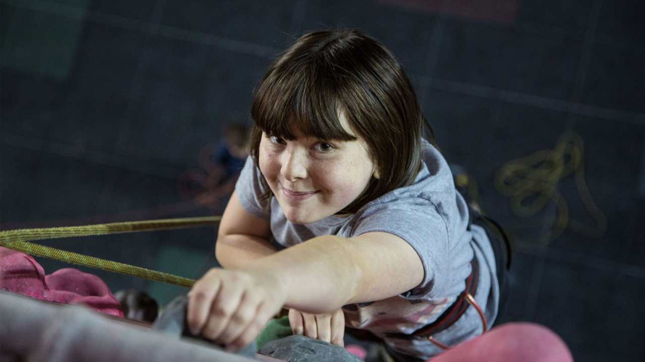 Girl climbing at Awesome Walls Climbing Liverpool