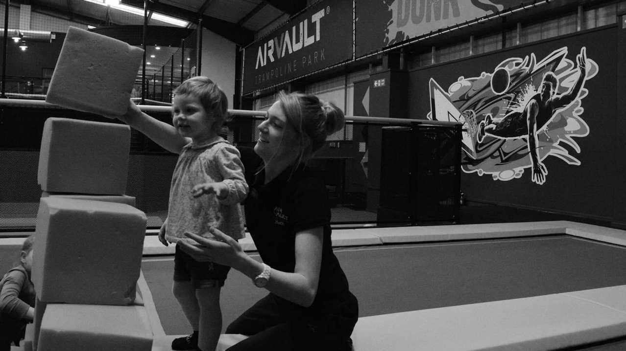 Girl playing with staff at AirVault Trampoline Park in Bolton Girl playing with staff at AirVault Trampoline Park in Bolton