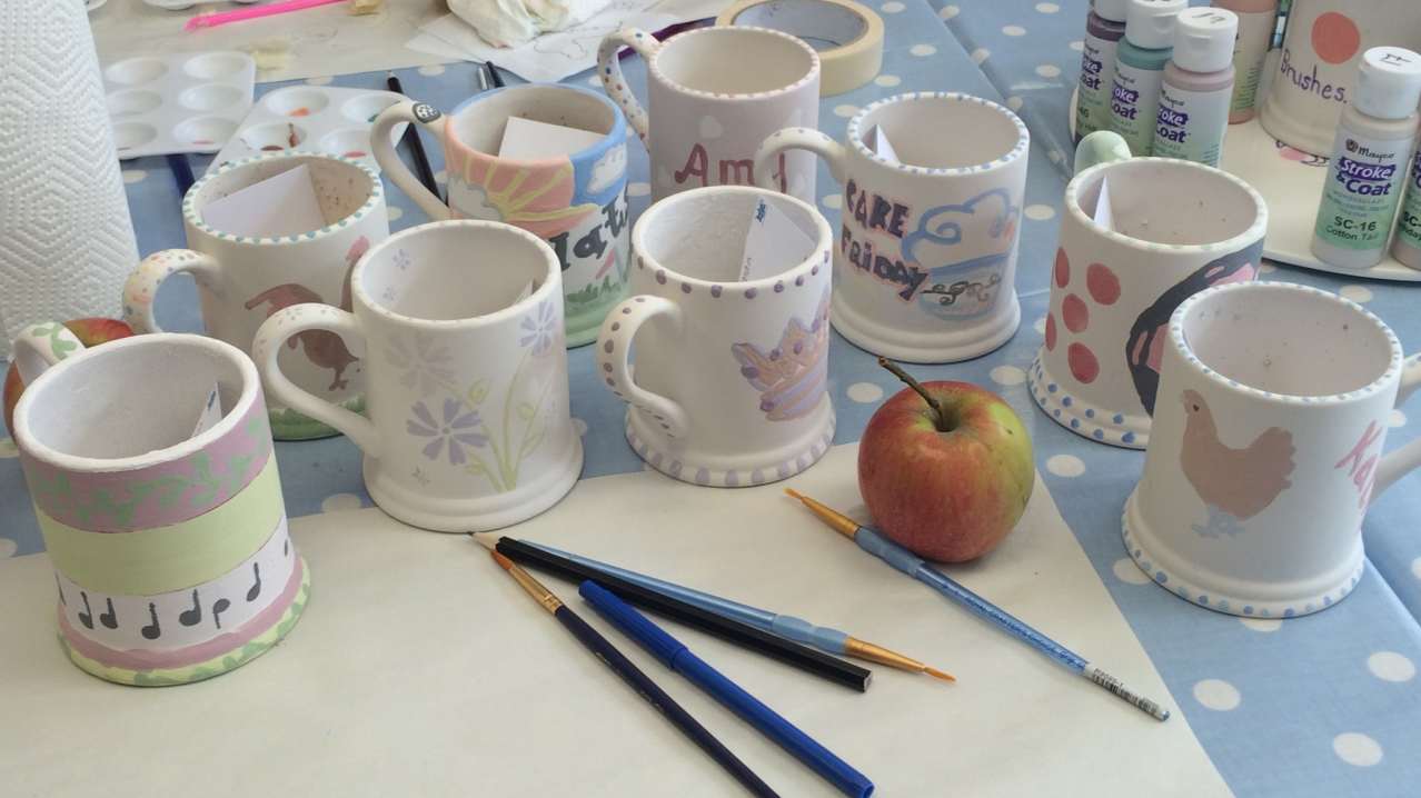 Painted mugs at Paint On Me Boutique Pottery Studio in Chepstow Painted mugs at Paint On Me Boutique Pottery Studio in Chepstow