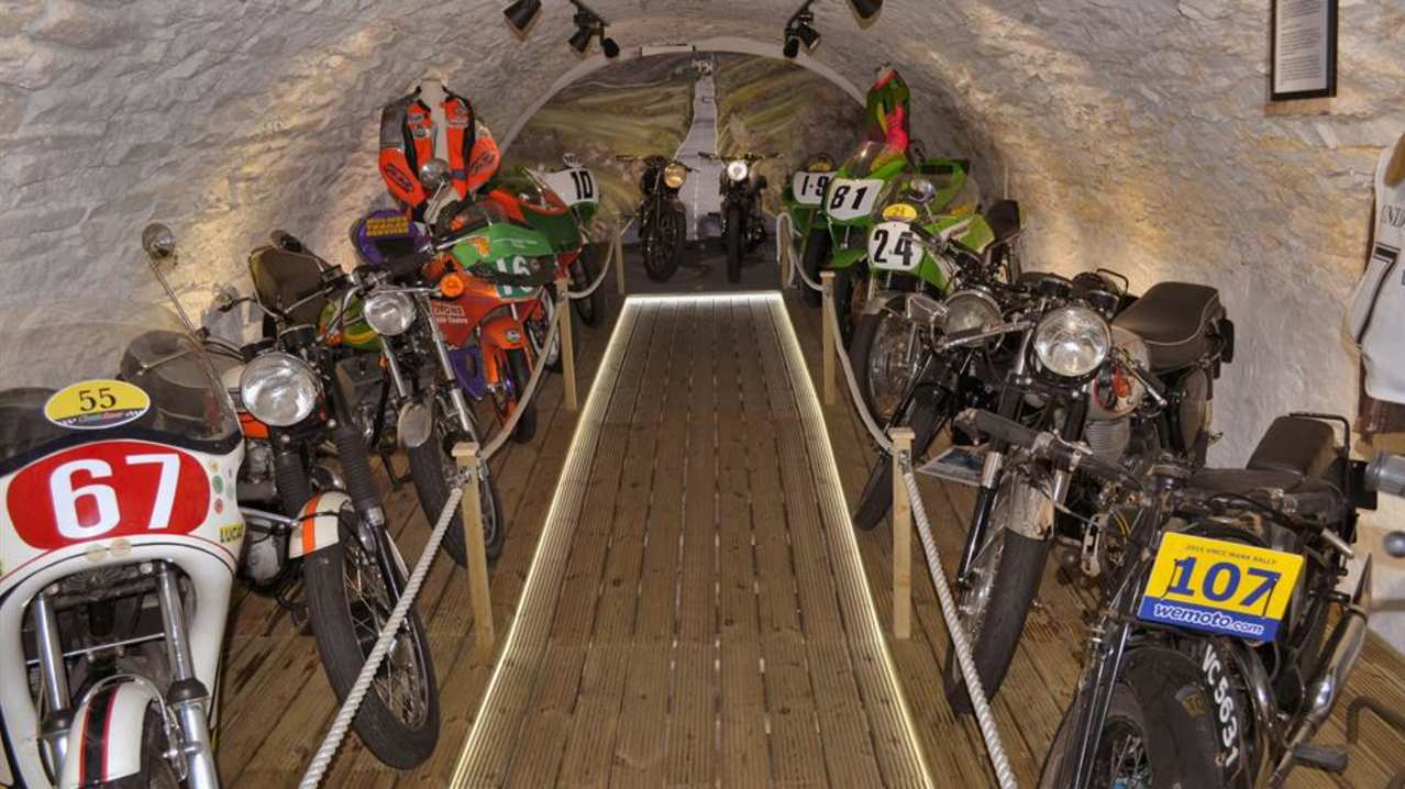 Retro bikes in bunker at Leece Museum in Peel Retro bikes in bunker at Leece Museum in Peel