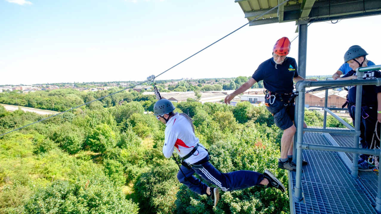 Kids on zip wire at Ackers Adventure in Birmingham