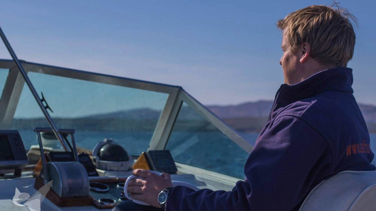 Man on boat at Sea Life Surveys in Isle of Mull Man on boat at Sea Life Surveys in Isle of Mull