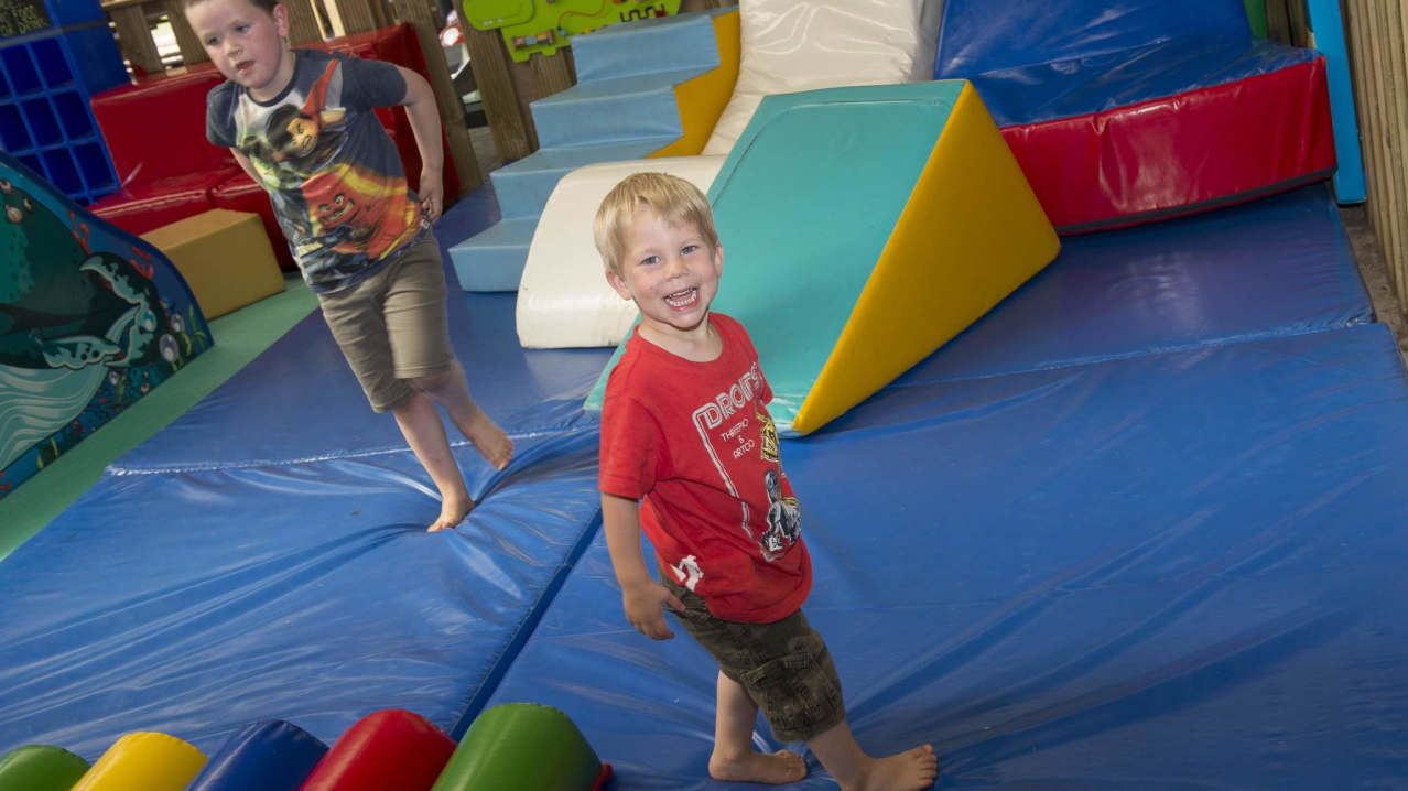 Kids playing in soft play area at Newbridge Farm Park in Ledbury
