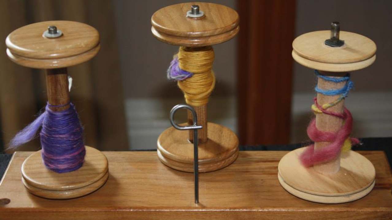 Wooden thread reel at Textile Towerhouse in Hawick