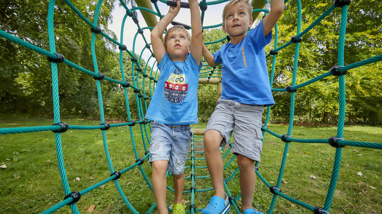 Kids on adventure playground at Sudeley Castle in Winchcombe Kids on adventure playground at Sudeley Castle in Winchcombe