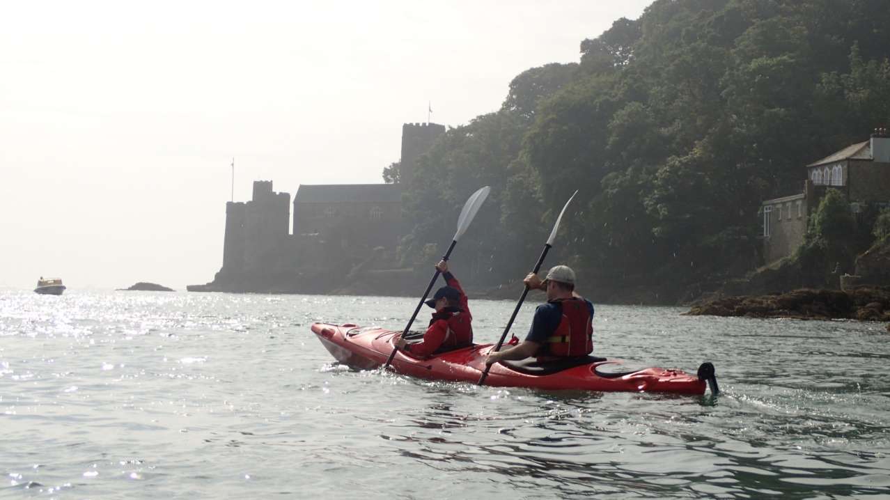 People kayaking at Sea Kayak Devon in Dartmouth People kayaking at Sea Kayak Devon in Dartmouth