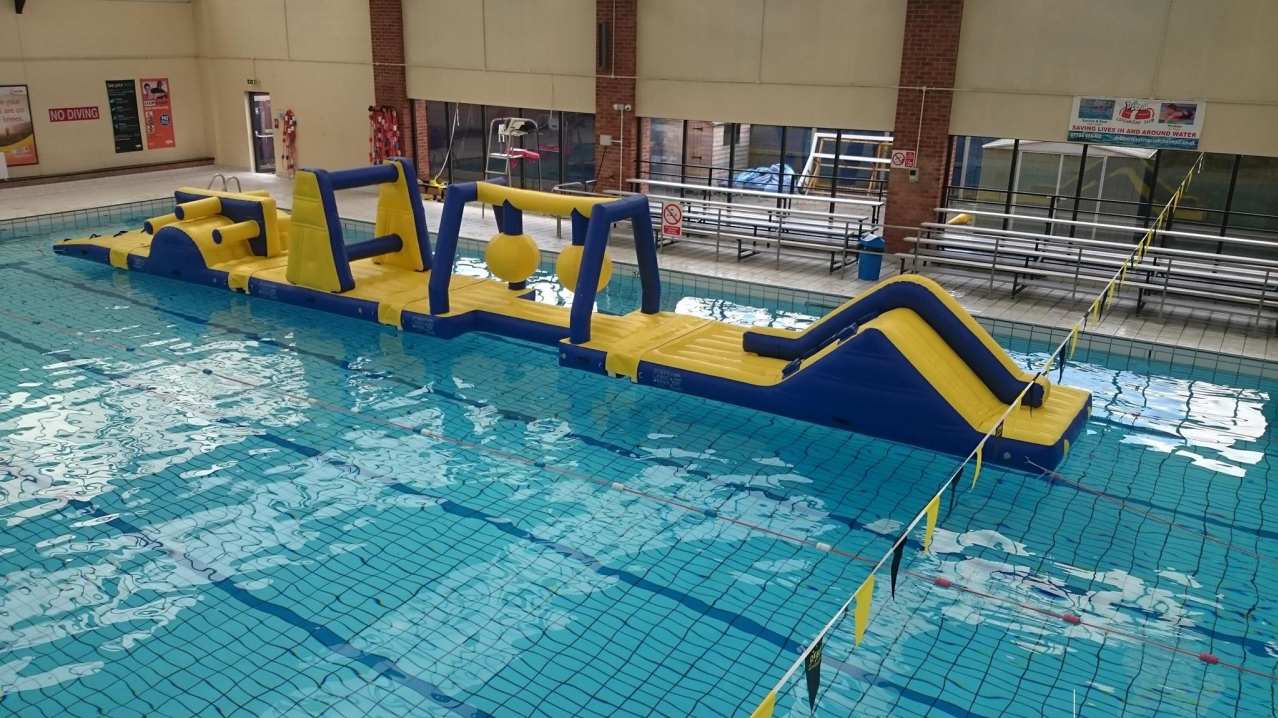 Inflatable assault course at Deben Swimming Pool in Woodbridge Inflatable assault course at Deben Swimming Pool in Woodbridge