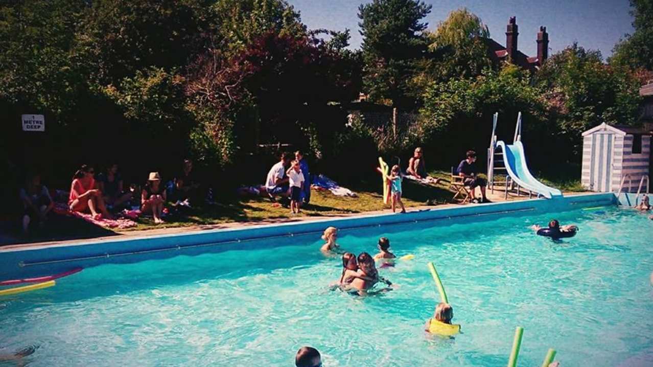 Families swimming outdoor at Findon Swimming Pool in Worthing