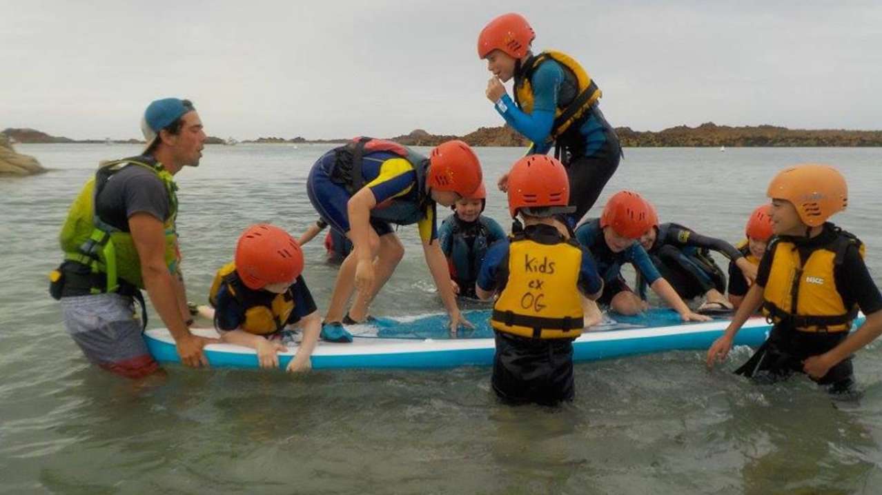 Kids on Paddle board at Outdoor Guernsey Kids on Paddle board at Outdoor Guernsey