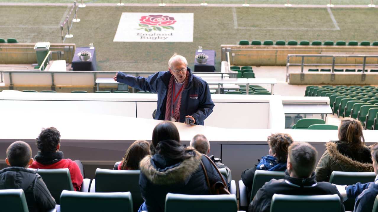 Tour guide taking group on Twickenham Stadium tour Tour guide taking group on Twickenham Stadium tour