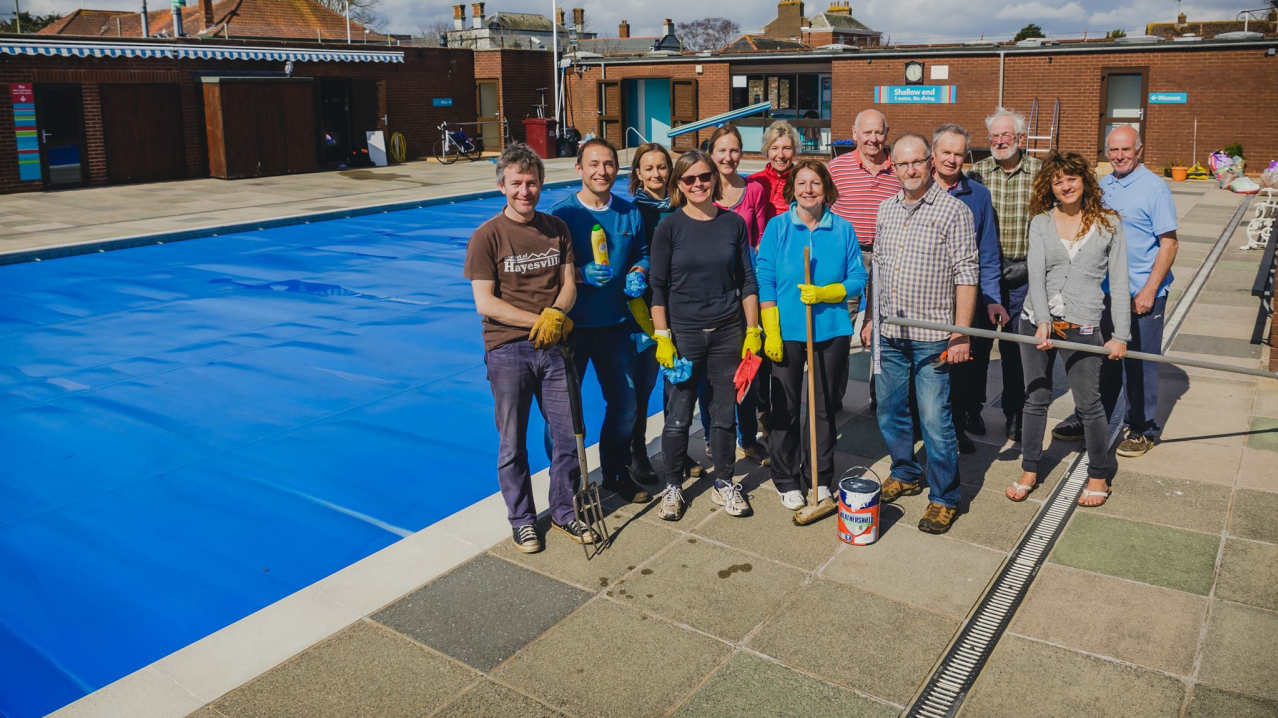 Volunteers by outdoor pool at Topsham Pool in Exeter Volunteers by outdoor pool at Topsham Pool in Exeter