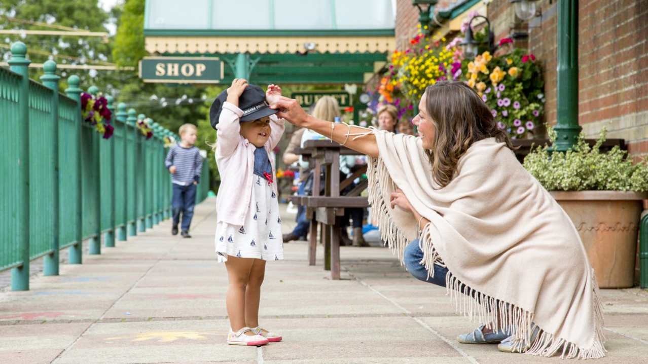 Mum with daughter on platform at Seaton Tramway