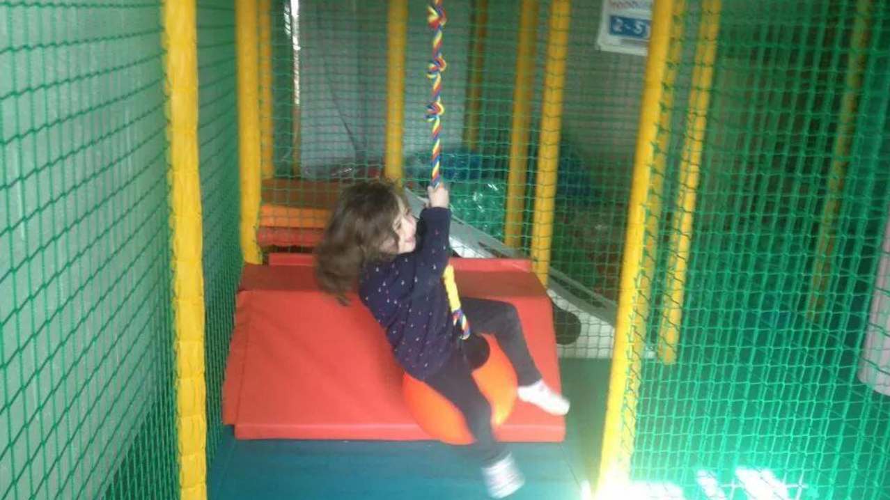 Girl in soft play area at Paradise Found Educational Farm Park in Sapcote Girl in soft play area at Paradise Found Educational Farm Park in Sapcote