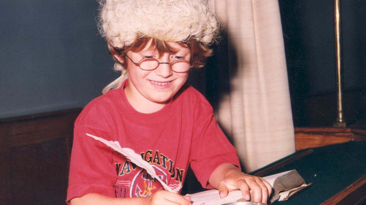 Boy wearing judge wig at The Judges Lodging in Presteigne Boy wearing judge wig at The Judges Lodging in Presteigne