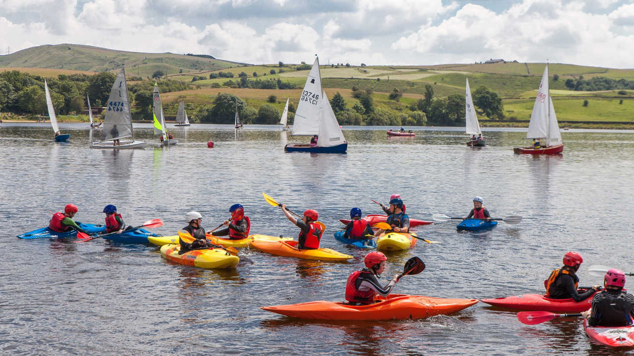 People kayaking at Hollingworth Lake Activity Centre in Littleborough People kayaking at Hollingworth Lake Activity Centre in Littleborough