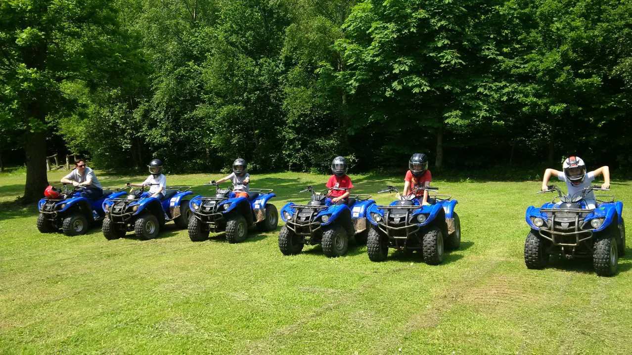 Kids on quad bikes at Arena Pursuits in Wadhurst