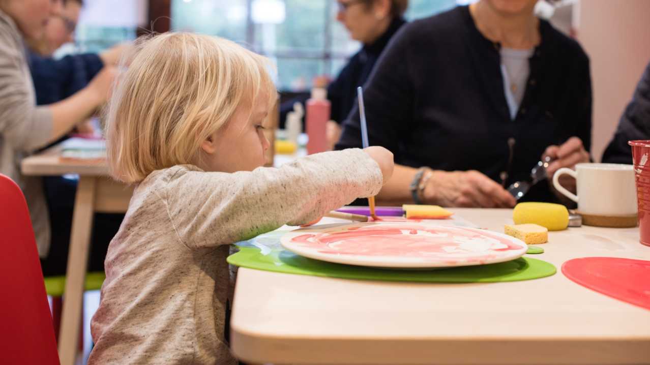 Boy painting at Apple Tree Studio in East Horsley Boy painting at Apple Tree Studio in East Horsley