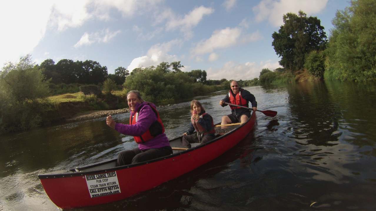 Family on canoe at The Sun Valley Canoeing Co in Bridgnorth Family on canoe at The Sun Valley Canoeing Co in Bridgnorth