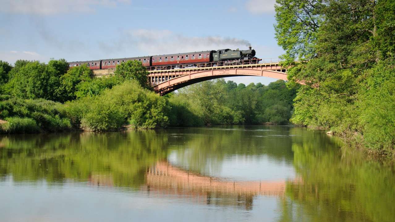 Steam train travelling from The Sun Valley Canoeing Co in Bridgnorth Steam train travelling from The Sun Valley Canoeing Co in Bridgnorth