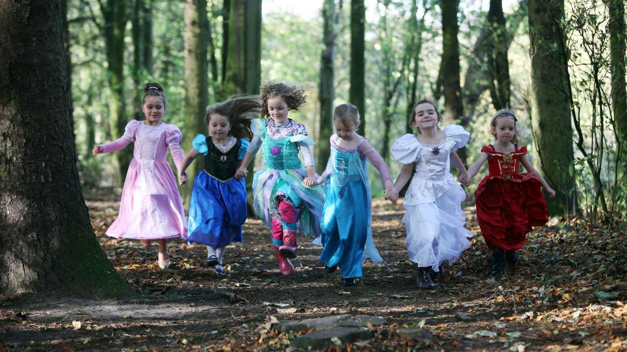 Girls in dresses running at Hardwick Park in Sedgefield Girls in dresses running at Hardwick Park in Sedgefield