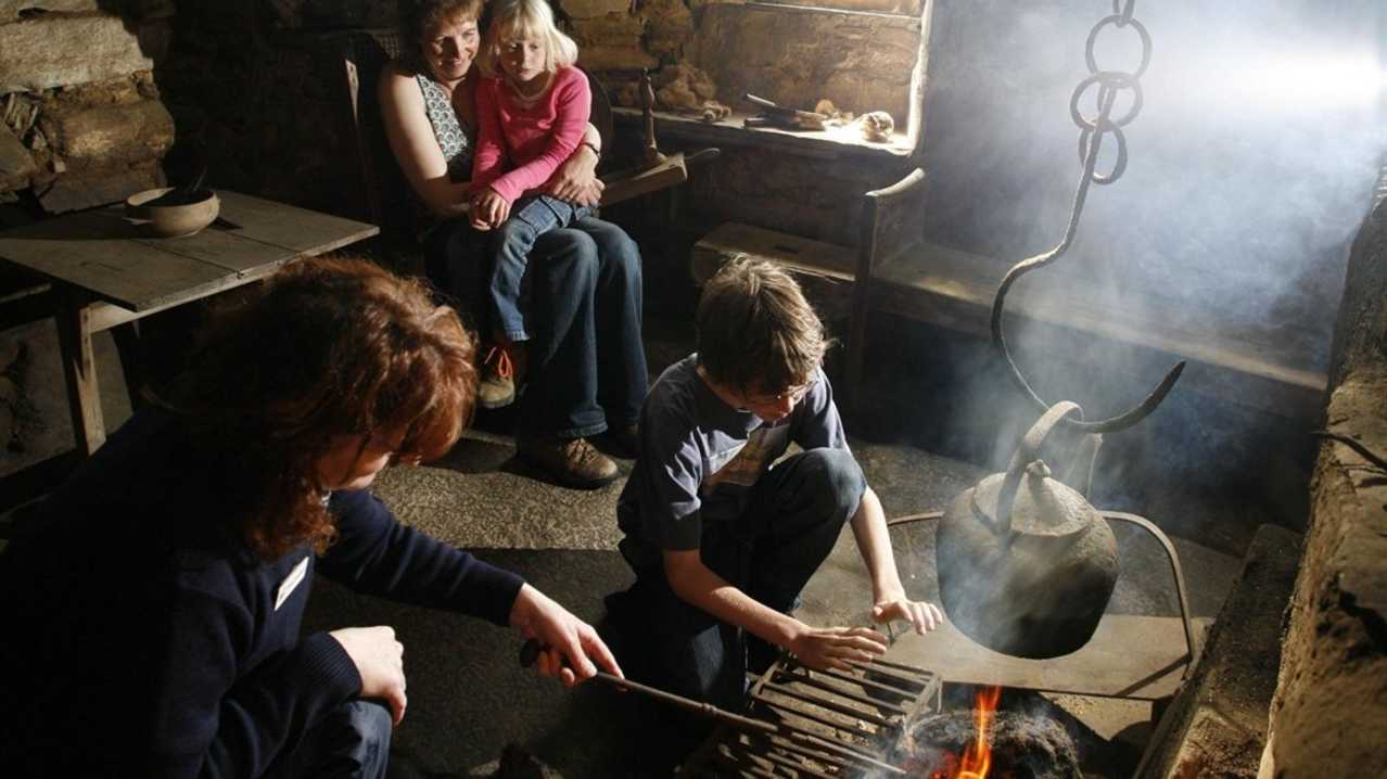 Family in historical room at Kirbuster Museum in The Orkney Isles
