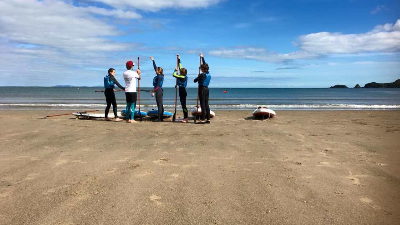 People on beach at Good Trails in Saundersfoot