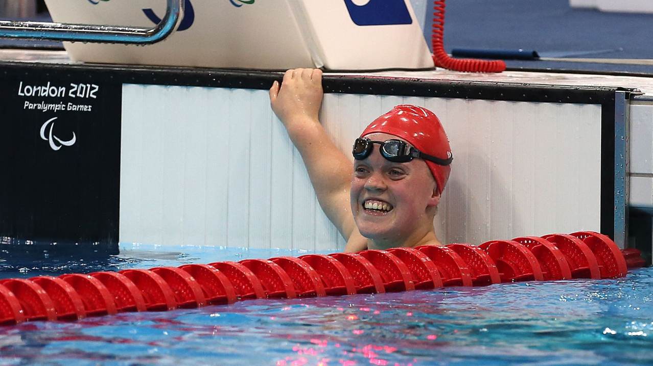 Woman in swimming pool at London Aquatics Centre