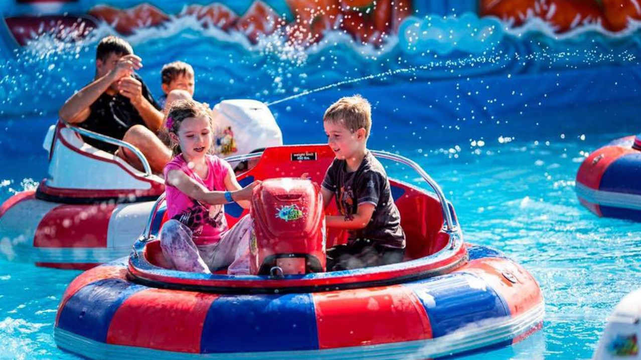 Kids on Crazy boats at Fun City at Brean Leisure Park in Burnham on Sea Kids on Crazy boats at Fun City at Brean Leisure Park in Burnham on Sea