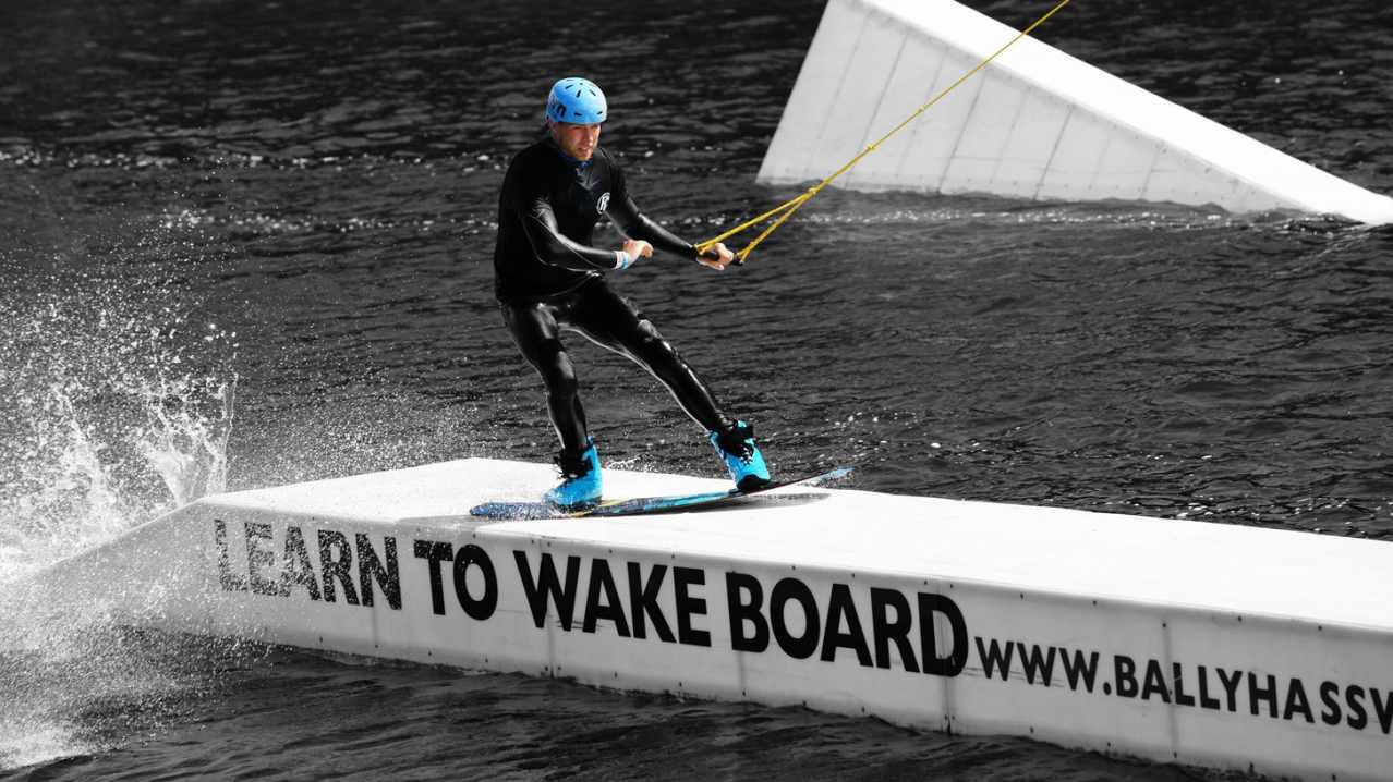 Man wakeboarding at Ballyhass Lakes Adventure Centre in Mallow Man wakeboarding at Ballyhass Lakes Adventure Centre in Mallow