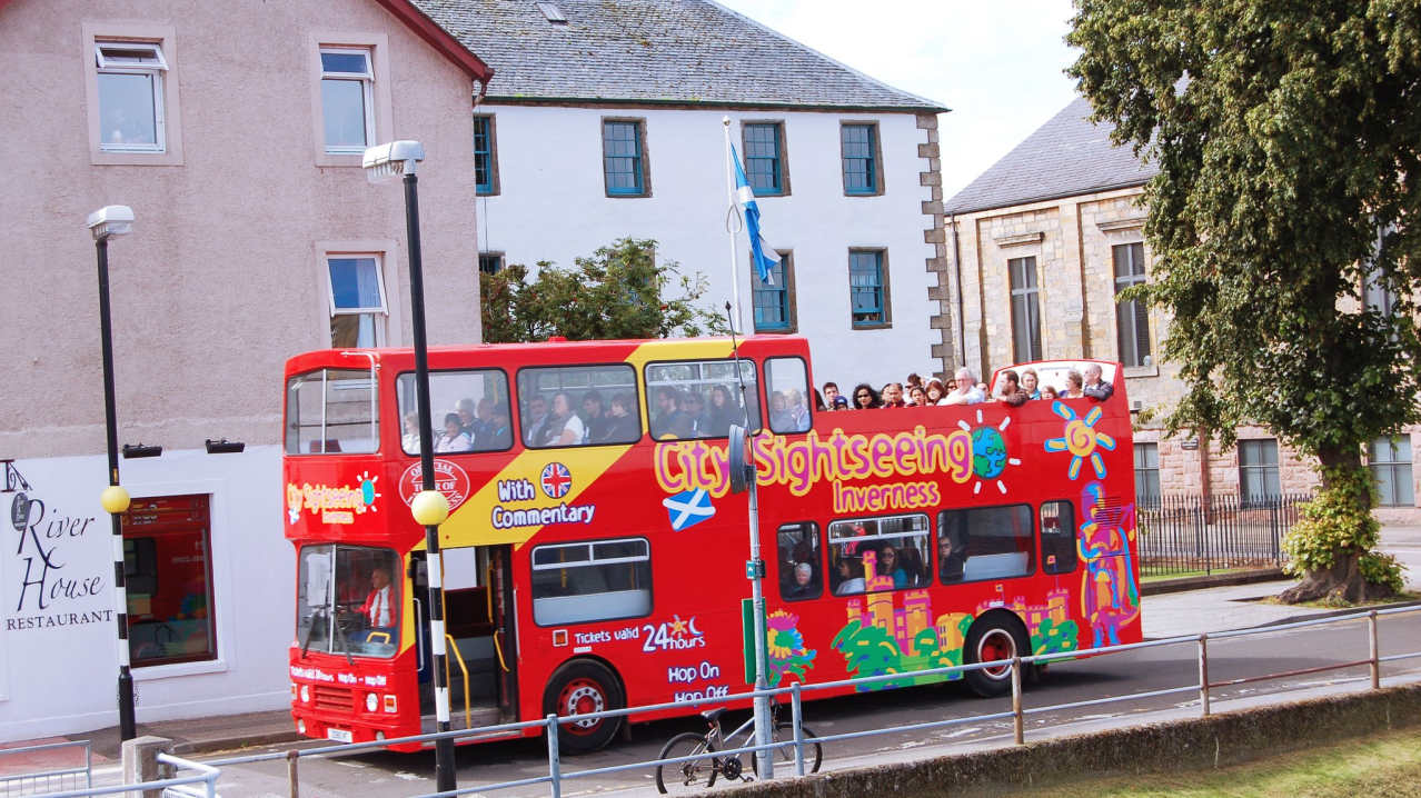 Passengers on City Sightseeing Inverness Hop On Hop Off bus Passengers on City Sightseeing Inverness Hop On Hop Off bus