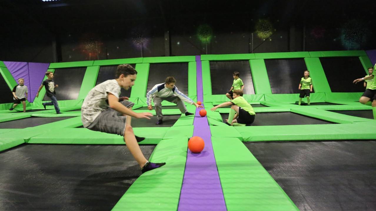 People playing dodgeball at High Altitude Trampoline Park in Norwich