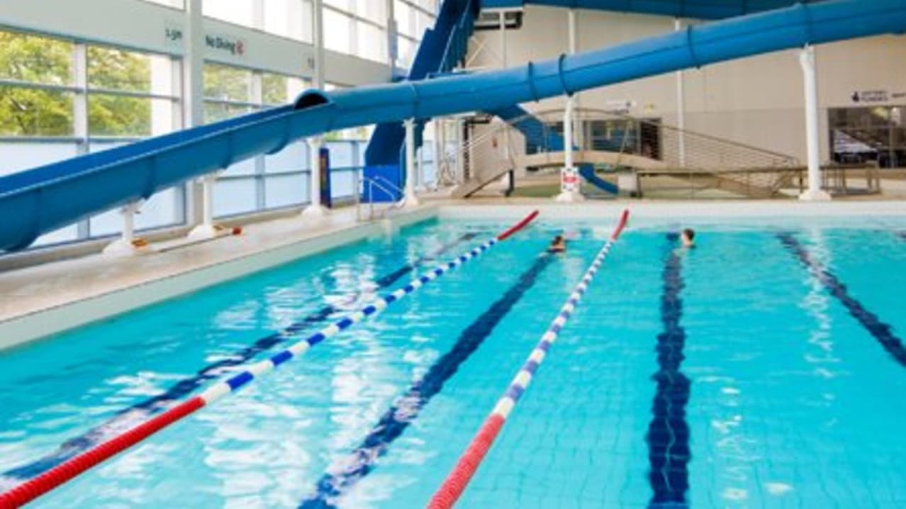 Swimming pool and slide at Glasgow Club Easterhouse Pool Swimming pool and slide at Glasgow Club Easterhouse Pool