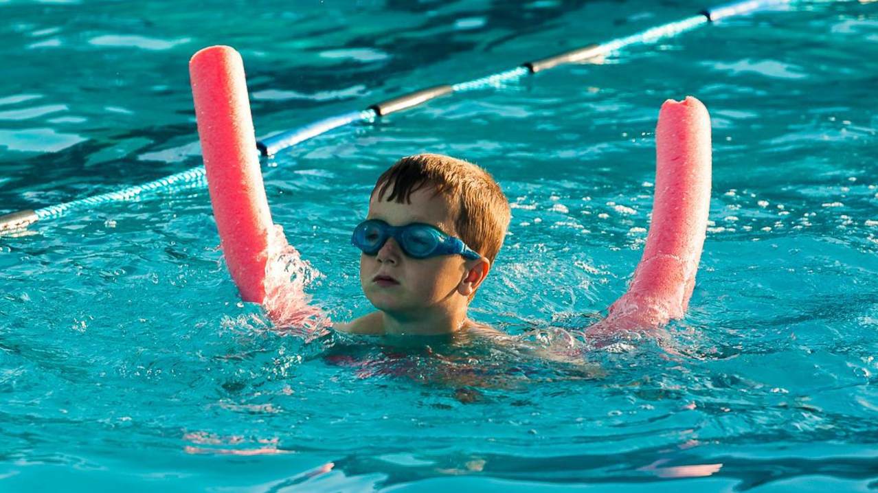 Boy swimming at Helmsley Open Air Swimming Pool Boy swimming at Helmsley Open Air Swimming Pool