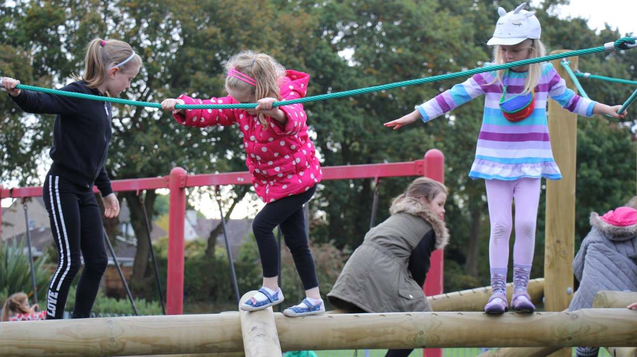 Girls on adventure playground in Blackbrook Park Play area in Fareham Girls on adventure playground in Blackbrook Park Play area in Fareham